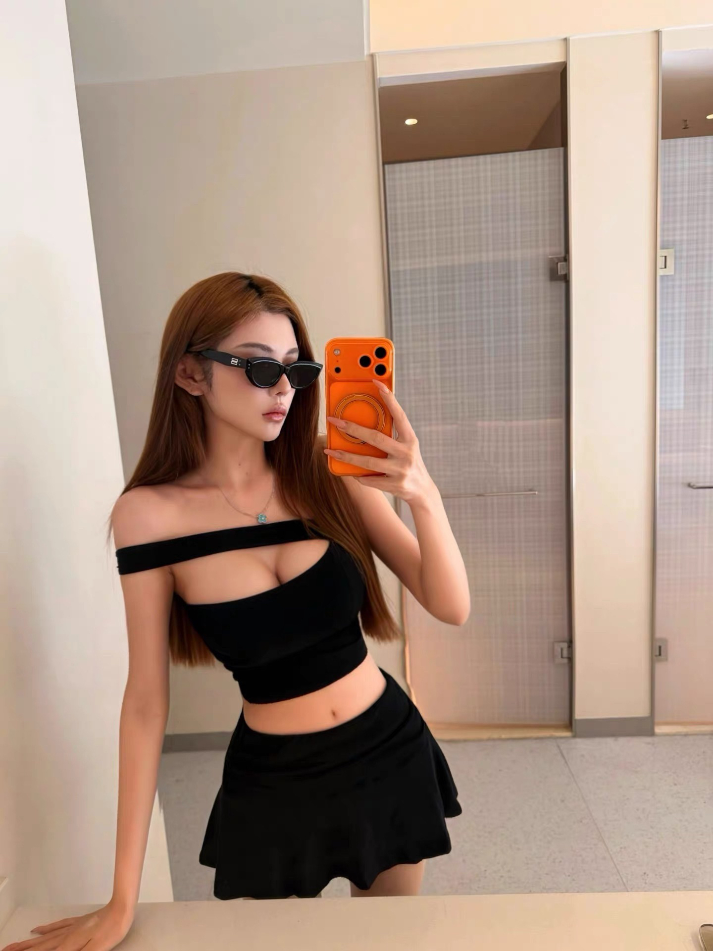 Korean Style Two-Piece Set with Padded One-Shoulder Crop Top and Mini Skirt with Safety Shorts
